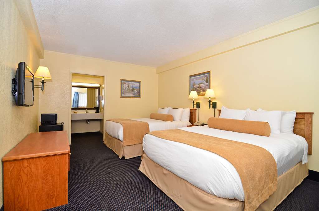Asam Hotel Goodland Værelse billede